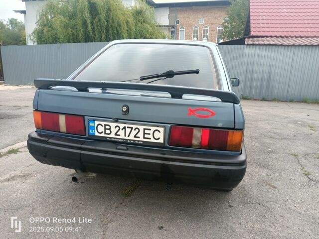 Серый Форд Эскорт, объемом двигателя 1.4 л и пробегом 300 тыс. км за 953 $, фото 3 на Automoto.ua