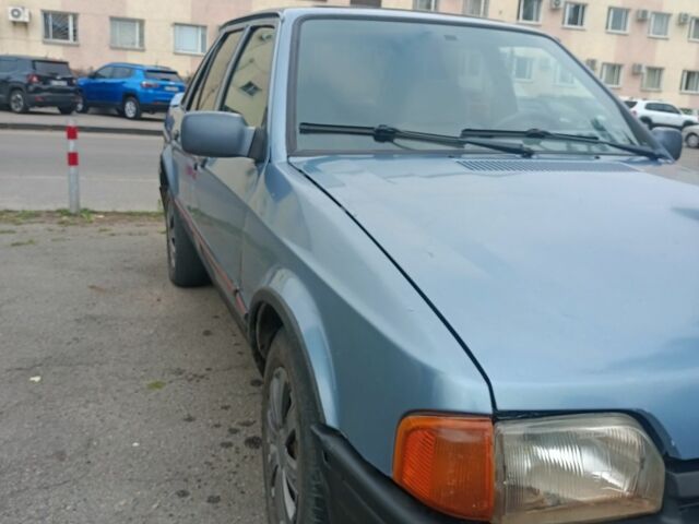 Серый Форд Эскорт, объемом двигателя 1.4 л и пробегом 300 тыс. км за 953 $, фото 2 на Automoto.ua