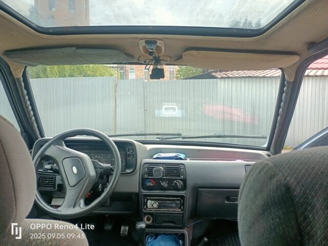 Серый Форд Эскорт, объемом двигателя 1.4 л и пробегом 300 тыс. км за 953 $, фото 6 на Automoto.ua