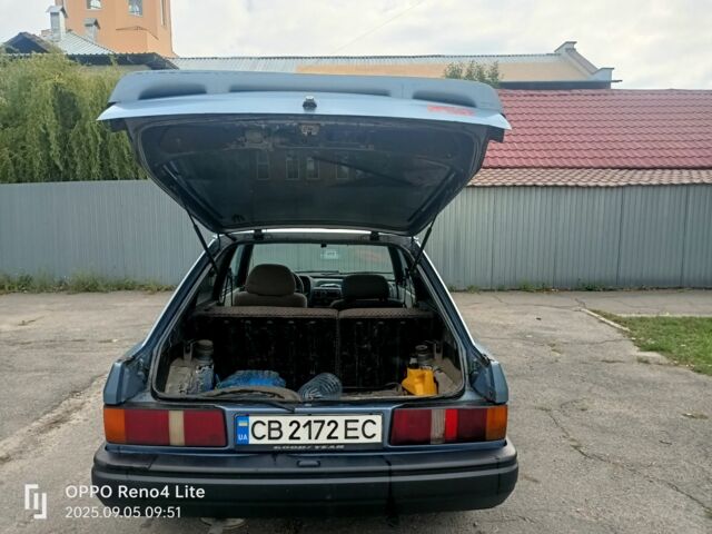 Серый Форд Эскорт, объемом двигателя 1.4 л и пробегом 300 тыс. км за 953 $, фото 7 на Automoto.ua