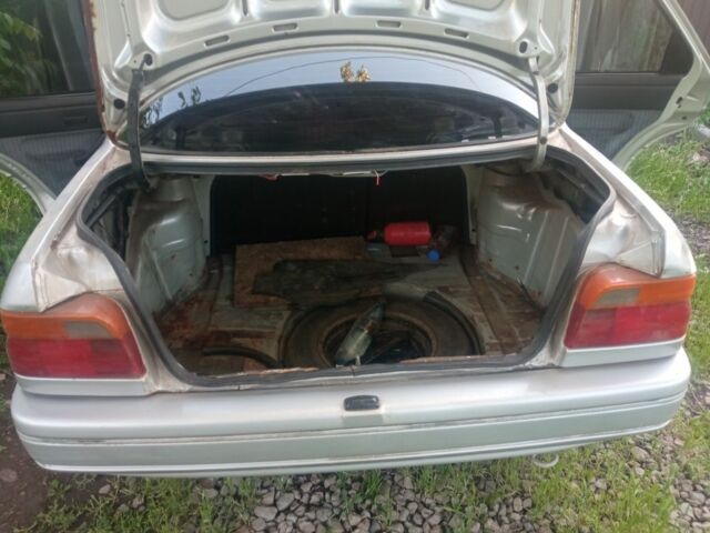 Серый Форд Эскорт, объемом двигателя 1.4 л и пробегом 300 тыс. км за 712 $, фото 11 на Automoto.ua