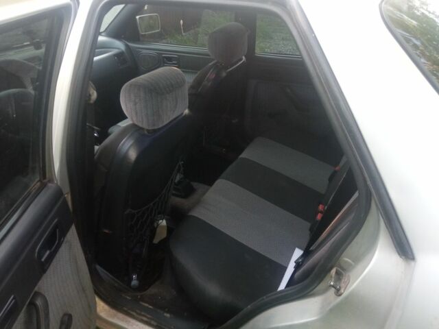 Серый Форд Эскорт, объемом двигателя 1.4 л и пробегом 300 тыс. км за 712 $, фото 8 на Automoto.ua