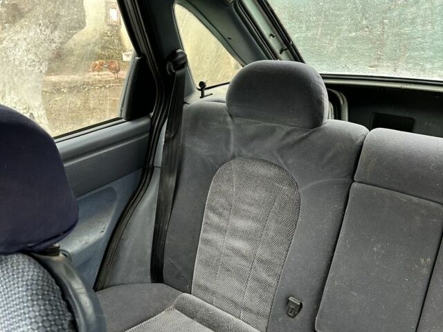 Серый Форд Эскорт, объемом двигателя 1.3 л и пробегом 67 тыс. км за 350 $, фото 12 на Automoto.ua