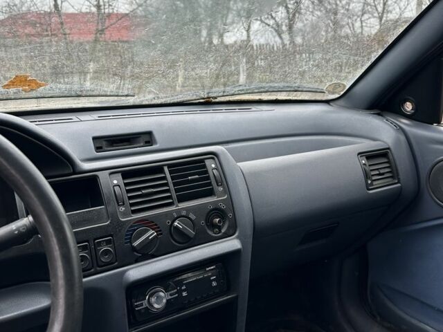 Серый Форд Эскорт, объемом двигателя 1.3 л и пробегом 67 тыс. км за 350 $, фото 11 на Automoto.ua