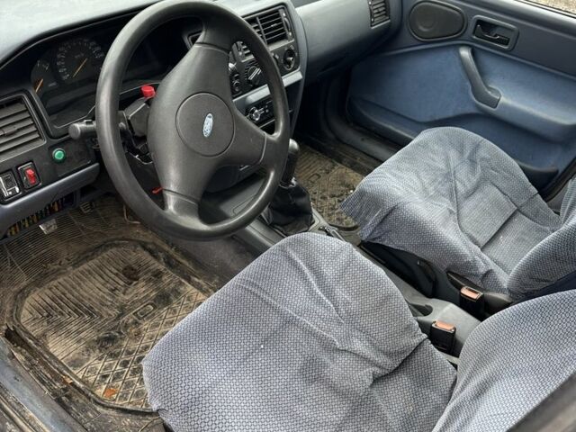 Серый Форд Эскорт, объемом двигателя 1.3 л и пробегом 67 тыс. км за 350 $, фото 10 на Automoto.ua