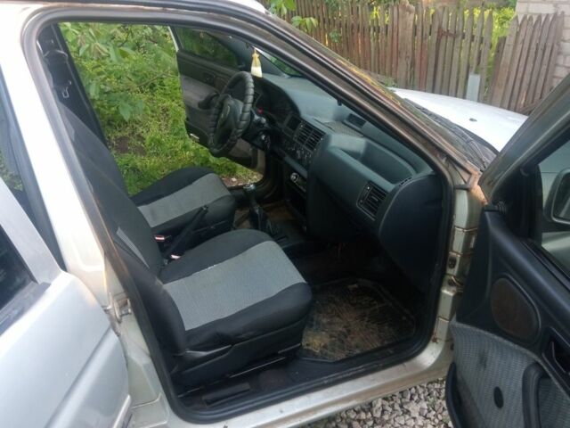 Серый Форд Эскорт, объемом двигателя 1.4 л и пробегом 300 тыс. км за 712 $, фото 10 на Automoto.ua