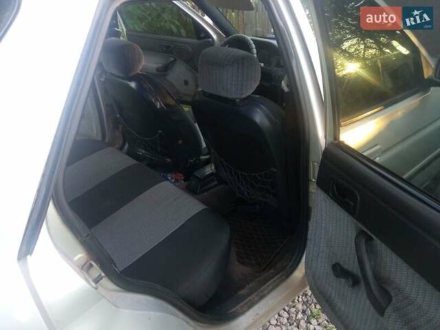 Серый Форд Эскорт, объемом двигателя 1.4 л и пробегом 600 тыс. км за 710 $, фото 6 на Automoto.ua