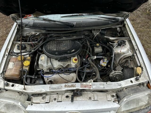 Серый Форд Эскорт, объемом двигателя 1.3 л и пробегом 67 тыс. км за 350 $, фото 4 на Automoto.ua