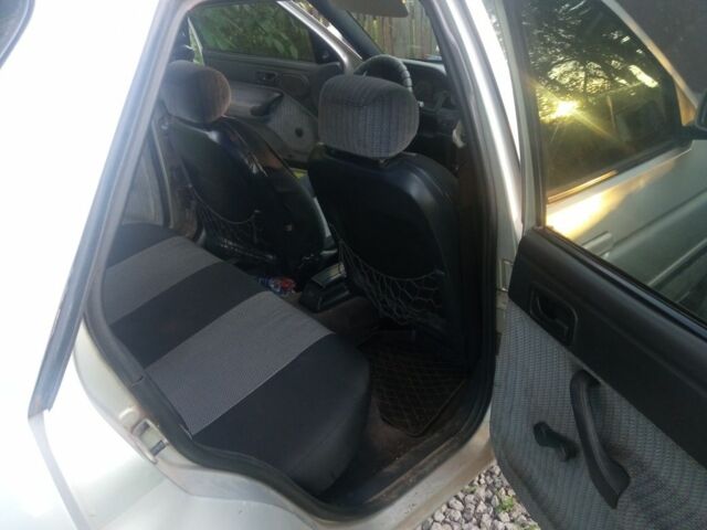 Серый Форд Эскорт, объемом двигателя 1.4 л и пробегом 300 тыс. км за 712 $, фото 9 на Automoto.ua