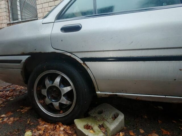 Серый Форд Эскорт, объемом двигателя 1.9 л и пробегом 300 тыс. км за 521 $, фото 5 на Automoto.ua