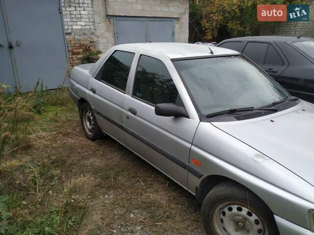 Серый Форд Эскорт, объемом двигателя 1.3 л и пробегом 258 тыс. км за 1000 $, фото 1 на Automoto.ua