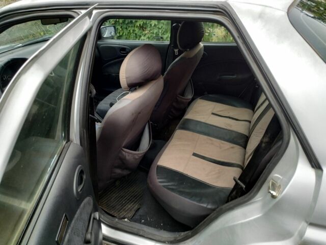 Серый Форд Эскорт, объемом двигателя 1.3 л и пробегом 258 тыс. км за 1000 $, фото 7 на Automoto.ua