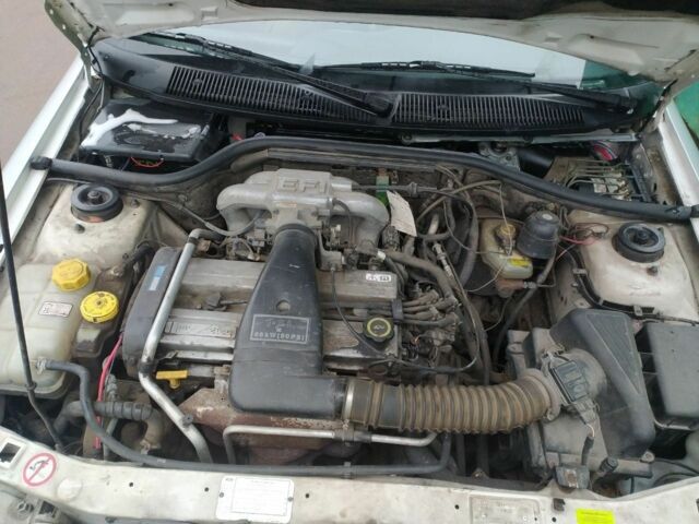 Серый Форд Эскорт, объемом двигателя 1.6 л и пробегом 164 тыс. км за 1450 $, фото 10 на Automoto.ua