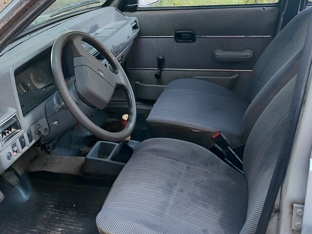 Серый Форд Эскорт, объемом двигателя 1.3 л и пробегом 180 тыс. км за 1417 $, фото 9 на Automoto.ua