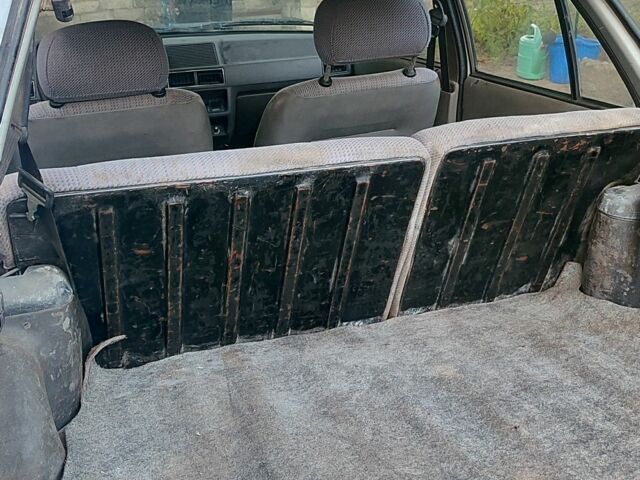 Серый Форд Эскорт, объемом двигателя 1.3 л и пробегом 180 тыс. км за 1417 $, фото 5 на Automoto.ua