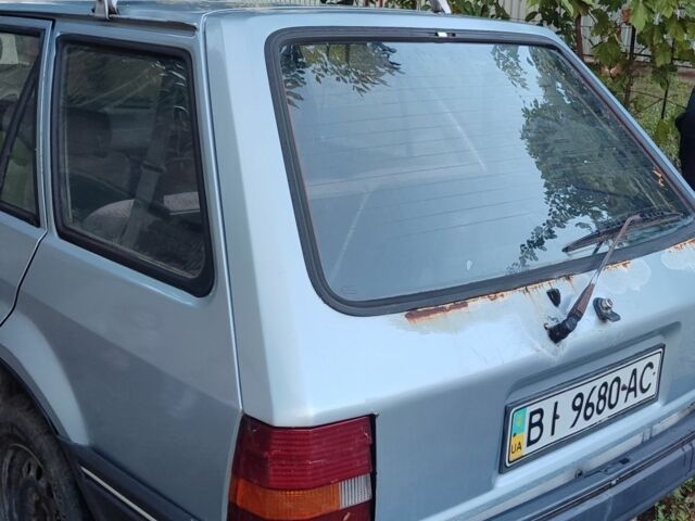 Серый Форд Эскорт, объемом двигателя 1.3 л и пробегом 180 тыс. км за 1417 $, фото 3 на Automoto.ua