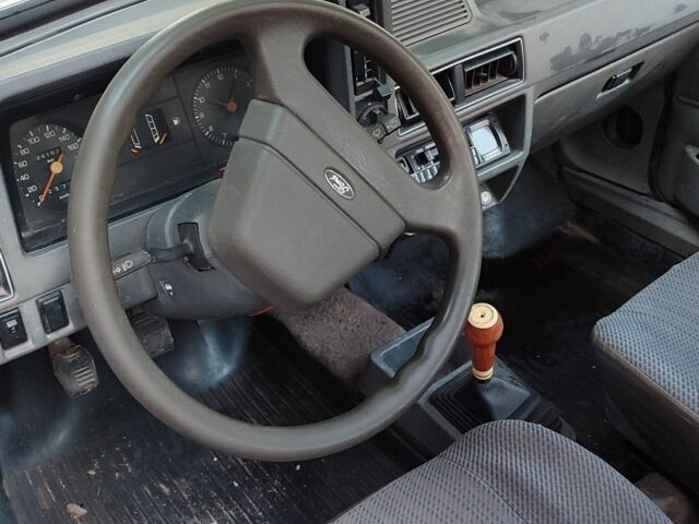 Серый Форд Эскорт, объемом двигателя 1.3 л и пробегом 180 тыс. км за 1417 $, фото 12 на Automoto.ua