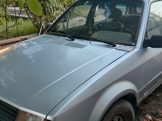 Серый Форд Эскорт, объемом двигателя 1.3 л и пробегом 180 тыс. км за 1417 $, фото 1 на Automoto.ua