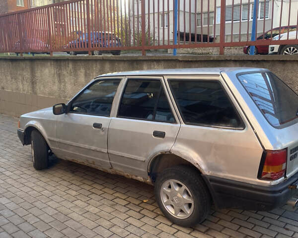 Сірий Форд Ескорт, об'ємом двигуна 1.26 л та пробігом 200 тис. км за 600 $, фото 3 на Automoto.ua