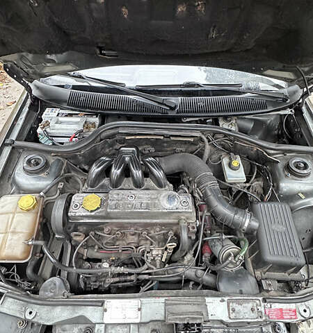 Сірий Форд Ескорт, об'ємом двигуна 1.8 л та пробігом 350 тис. км за 2700 $, фото 19 на Automoto.ua