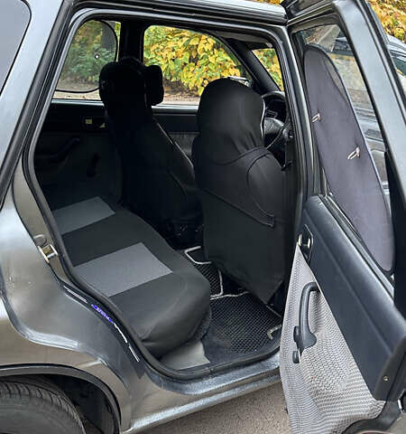 Сірий Форд Ескорт, об'ємом двигуна 1.8 л та пробігом 350 тис. км за 2700 $, фото 16 на Automoto.ua