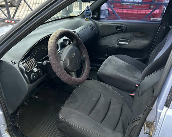 Серый Форд Эскорт, объемом двигателя 1.59 л и пробегом 350 тыс. км за 850 $, фото 9 на Automoto.ua