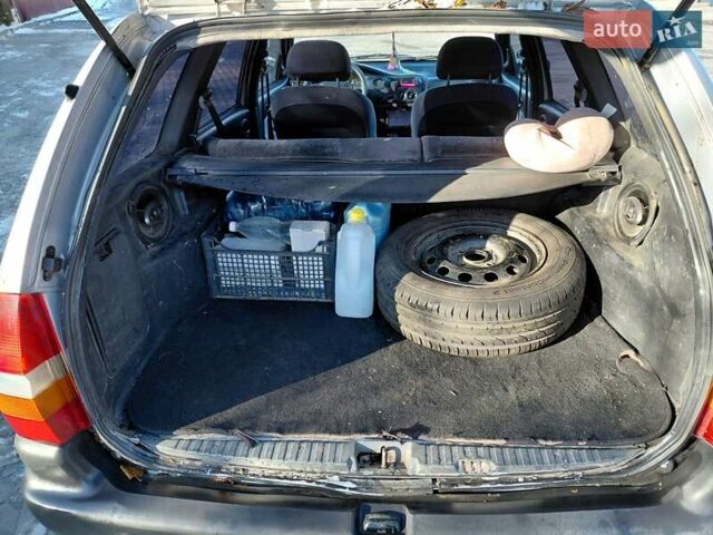 Сірий Форд Ескорт, об'ємом двигуна 1.8 л та пробігом 289 тис. км за 1000 $, фото 16 на Automoto.ua