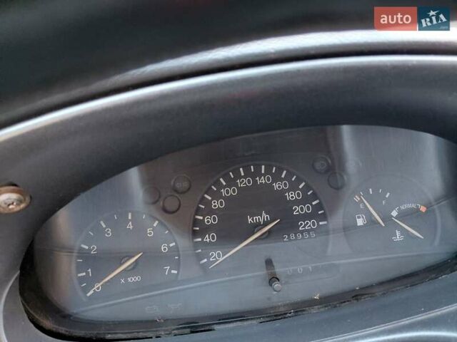 Сірий Форд Ескорт, об'ємом двигуна 1.8 л та пробігом 289 тис. км за 1000 $, фото 19 на Automoto.ua