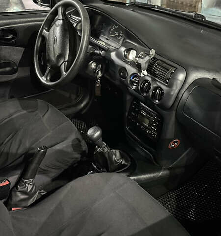 Серый Форд Эскорт, объемом двигателя 1.6 л и пробегом 602 тыс. км за 3000 $, фото 10 на Automoto.ua