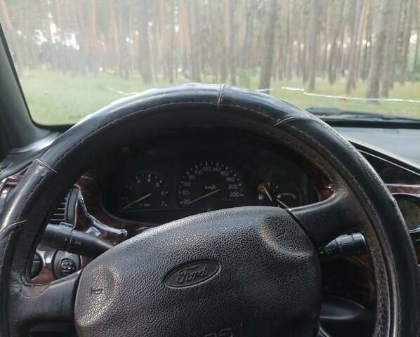 Серый Форд Эскорт, объемом двигателя 1.8 л и пробегом 238 тыс. км за 2413 $, фото 7 на Automoto.ua