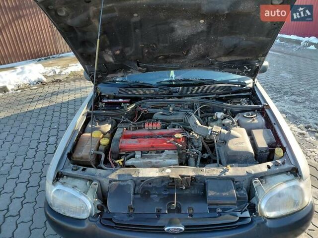 Сірий Форд Ескорт, об'ємом двигуна 1.8 л та пробігом 289 тис. км за 1000 $, фото 17 на Automoto.ua