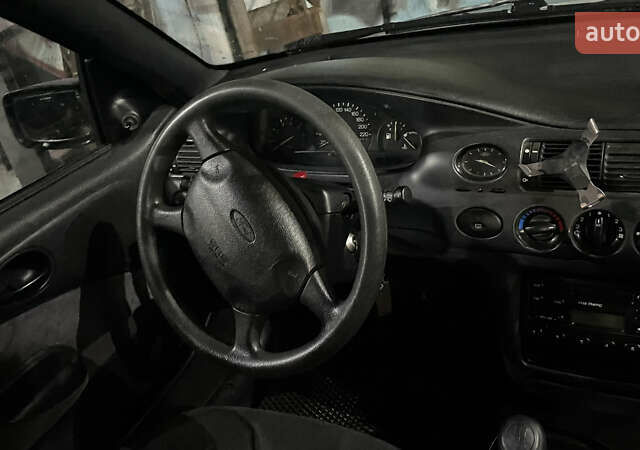 Серый Форд Эскорт, объемом двигателя 1.6 л и пробегом 602 тыс. км за 3000 $, фото 11 на Automoto.ua