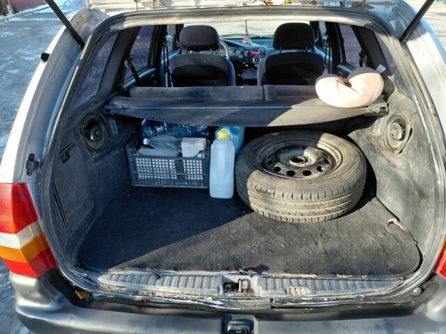 Сірий Форд Ескорт, об'ємом двигуна 1.8 л та пробігом 289 тис. км за 1000 $, фото 16 на Automoto.ua