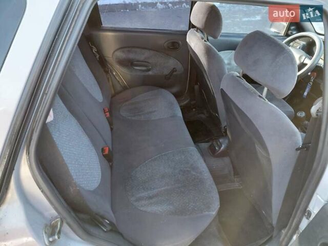 Сірий Форд Ескорт, об'ємом двигуна 1.8 л та пробігом 289 тис. км за 1000 $, фото 15 на Automoto.ua
