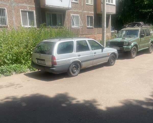 Серый Форд Эскорт, объемом двигателя 1.6 л и пробегом 200 тыс. км за 2100 $, фото 1 на Automoto.ua