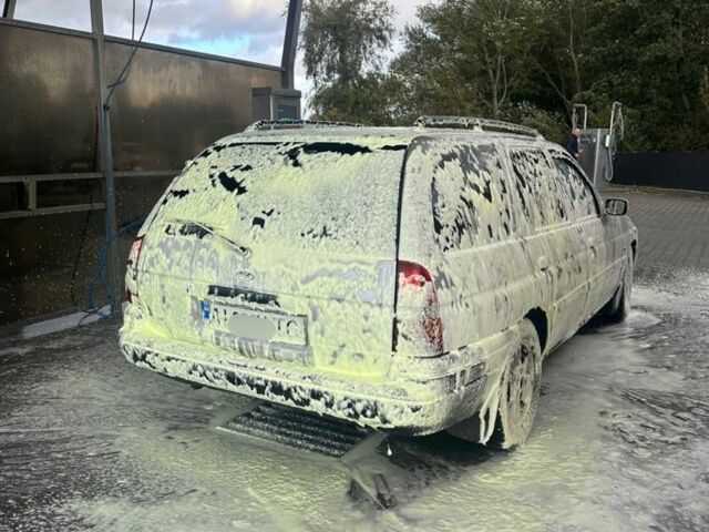 Серый Форд Эскорт, объемом двигателя 1.6 л и пробегом 228 тыс. км за 1402 $, фото 2 на Automoto.ua