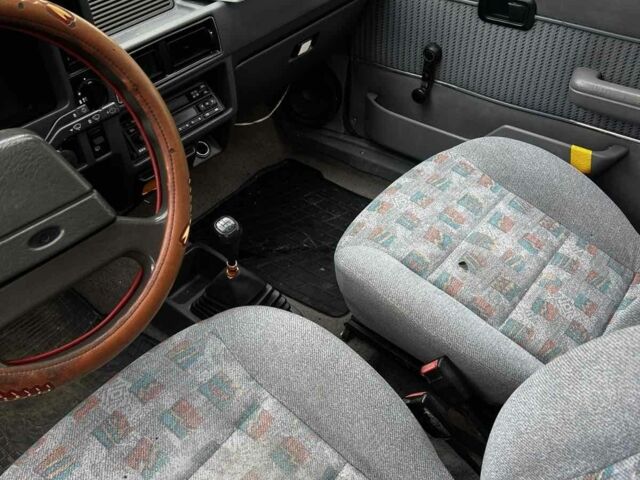 Серый Форд Эскорт, объемом двигателя 1.1 л и пробегом 360 тыс. км за 500 $, фото 4 на Automoto.ua