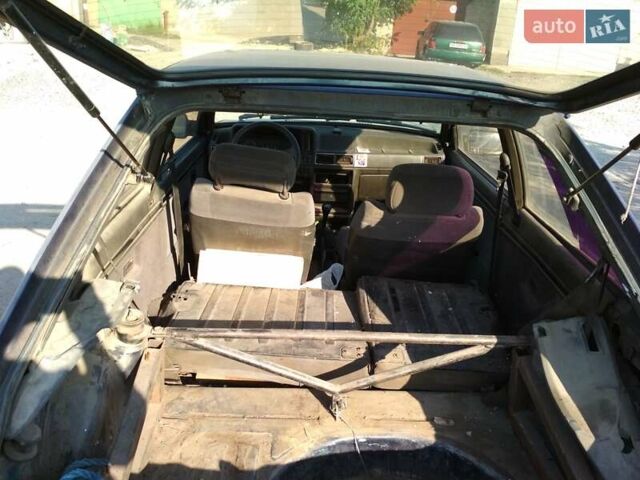 Синий Форд Эскорт, объемом двигателя 1.6 л и пробегом 180 тыс. км за 800 $, фото 4 на Automoto.ua