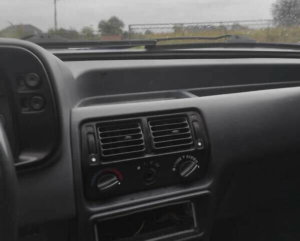 Синий Форд Эскорт, объемом двигателя 1.4 л и пробегом 100 тыс. км за 700 $, фото 1 на Automoto.ua