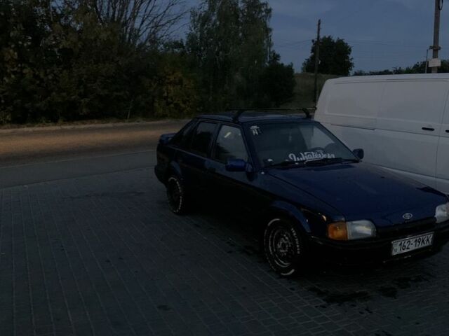 Синий Форд Эскорт, объемом двигателя 1.4 л и пробегом 117 тыс. км за 1100 $, фото 6 на Automoto.ua
