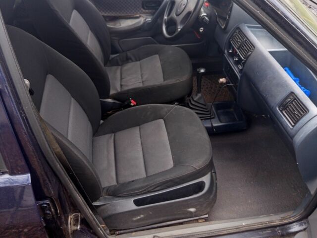 Синий Форд Эскорт, объемом двигателя 1.4 л и пробегом 777 тыс. км за 608 $, фото 5 на Automoto.ua