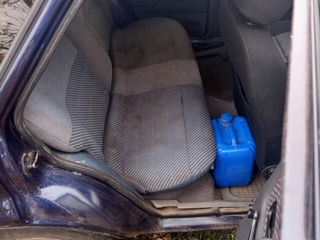 Синий Форд Эскорт, объемом двигателя 1.4 л и пробегом 777 тыс. км за 608 $, фото 4 на Automoto.ua