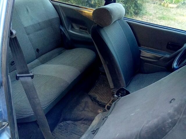 Синий Форд Эскорт, объемом двигателя 1.4 л и пробегом 215 тыс. км за 600 $, фото 5 на Automoto.ua