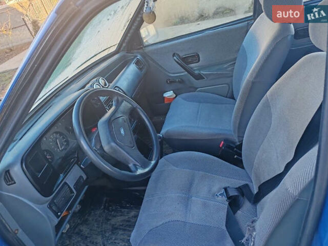 Синій Форд Ескорт, об'ємом двигуна 1.4 л та пробігом 150 тис. км за 850 $, фото 4 на Automoto.ua