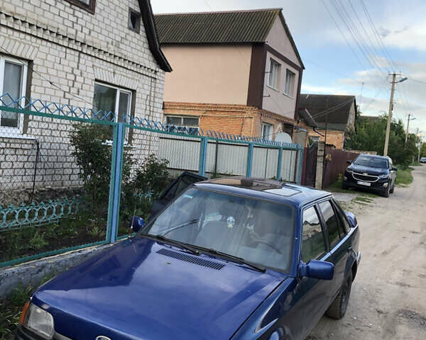 Синий Форд Эскорт, объемом двигателя 1.4 л и пробегом 117 тыс. км за 1100 $, фото 2 на Automoto.ua