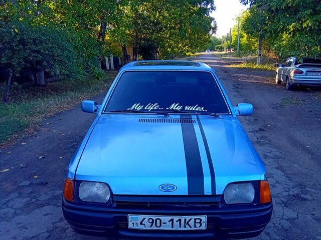 Синий Форд Эскорт, объемом двигателя 1.4 л и пробегом 215 тыс. км за 600 $, фото 1 на Automoto.ua