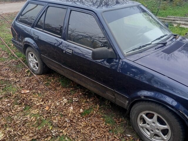 Синий Форд Эскорт, объемом двигателя 1.4 л и пробегом 777 тыс. км за 608 $, фото 3 на Automoto.ua