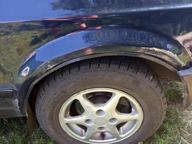 Синий Форд Эскорт, объемом двигателя 1.4 л и пробегом 777 тыс. км за 608 $, фото 6 на Automoto.ua