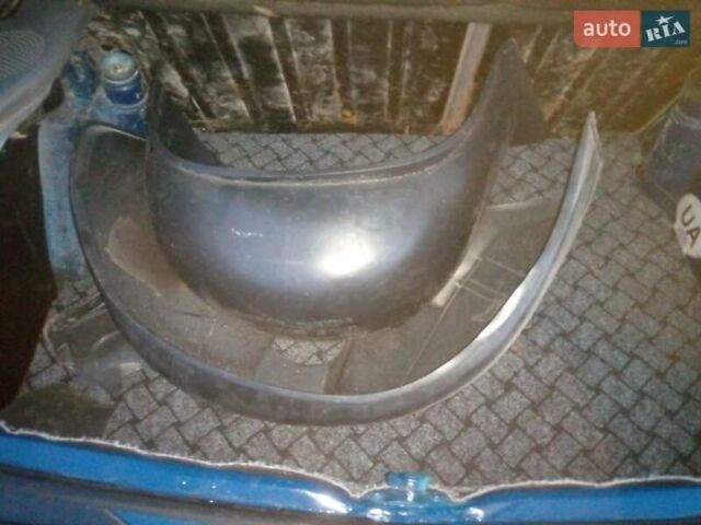 Синий Форд Эскорт, объемом двигателя 1.4 л и пробегом 70 тыс. км за 1250 $, фото 12 на Automoto.ua