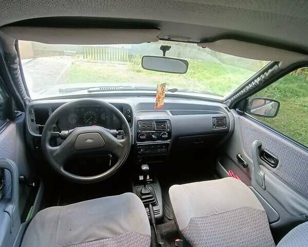 Синий Форд Эскорт, объемом двигателя 1.3 л и пробегом 100 тыс. км за 800 $, фото 3 на Automoto.ua